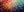 A large horizontal hand-painted abstract oil painting featuring a 3D textured floral explosion with thick impasto petals in vibrant rainbow colors like red, orange, teal, and purple.