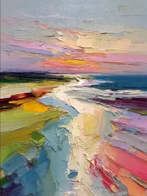 Vibrant vertical hand-painted oil painting of a sunset beach with heavy impasto texture in shades of pink, orange, and blue, displayed above a low wooden table in a minimalist room.