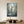 Handmade modern abstract oil painting depicting an ethereal angel silhouette surrounded by sweeping, texturized wave brushstrokes in deep blue, light azure, and radiant gold leaf accents.