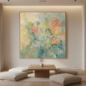Premium handmade abstract oil painting depicting a dreamy garden with soft pastel pink flowers, sage green leaves, and warm yellow brushstrokes.