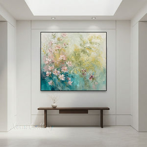 Premium handmade abstract oil painting depicting delicate blush pink flowers blooming over a rich teal, green, and gold textured background.