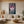Handmade modern expressionist oil painting showcasing a dense cluster of magenta and deep pink roses with dramatic vertical white and light pink paint drips cascading down against a moody dark green and black gradient background.