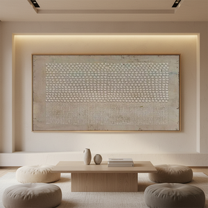Handmade Wabi Sabi abstract oil painting featuring relief-like dots and vertical textured lines in beige and cream, hanging on a white wall in a modern staircase gallery setting.