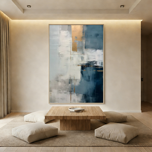 Handmade modern abstract oil painting featuring navy blue and grey color blocks with shimmering gold foil accents and thick textured brushstrokes.