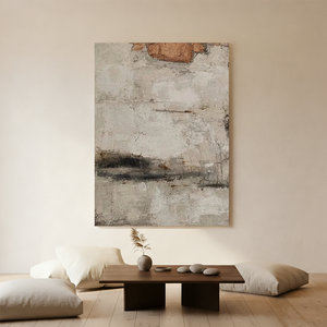 Vertical hand-painted abstract oil painting with heavy texture in beige, cream, and black, styled in a minimalist boho living room above a wooden coffee table.