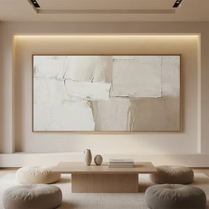 Handmade minimalist abstract oil painting featuring large geometric blocks of beige and cream with heavy impasto texture, styled in a warm, modern living room above a low wooden table.