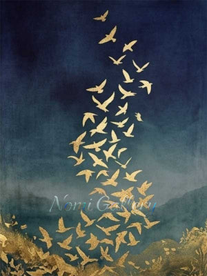 Handmade modern romantic abstract oil painting showcasing a magnificent flock of birds glinting in textured metallic gold leaf, spiraling upward in an elegant curve against a dark navy blue and moody teal sky backdrop.