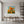 Premium handmade impressionist oil painting featuring vibrant orange California poppies against a sky-blue backdrop, crafted with heavy 3D palette knife impasto texture.