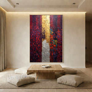 A 100% handmade abstract expressionist oil painting featuring vertical texture bands of burgundy red, crimson, and plum, with a heavily thick impasto center stripe of metallic gold and silver white paint.