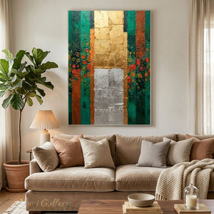 A 100% handmade abstract modern oil painting featuring vertical stripes of emerald green and ochre with colorful dotted textures, centered by a thick impasto block of metallic gold leaf on top and metallic silver leaf on the bottom.