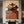 Handcrafted abstract cowboy group oil painting with rich brown textures hanging in a modern living room or rustic office