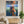 Handmade impressionist oil painting of a woman wearing a bikini diving underwater in a blue sea, with vibrant orange sunlight reflections and water ripples.