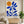 100% hand-painted mid-century minimalist abstract oil painting featuring a geometric cobalt blue flower and a warm orange sun on a neutral cream canvas, styled as an oversized statement art piece above a wooden coffee table in a modern minimal living room as seen in Large-Blue-Abstract-for-room-decor.jpg and Large-Blue-Abstract-for-modern-living-room.jpg.