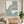 100% hand-painted minimalist textured geometric abstract oil painting featuring heavy impasto sage green and warm sand arches on a plaster white canvas background, styled as an oversized statement art piece above a low wooden coffee table in a warm modern living room setting as seen in Minimalist-Arc-Art-for-room-decor.jpg and Minimalist-Arc-Art-for-modern-living-room.jpg.