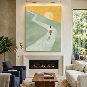 Hand-painted minimalist textured oil painting featuring a woman in a terracotta skirt walking on a winding path towards a large golden sun on green hills.