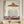 100% handmade modern minimalist woman oil painting with neutral tones and textured stripes, displayed as luxury wall decor in an art corridor by Savy Canvas.