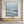 Textured-ocean-wall-art-above-the-wooden-cabinet-07.webp
