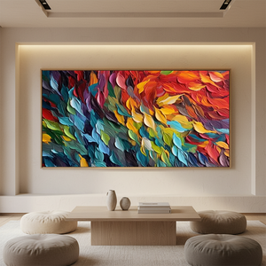 Close-up of a hand-painted 3D abstract oil painting featuring thick impasto texture in vibrant red, blue, and yellow strokes, styled for a modern minimalist living room.