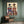 Abstract Figures in Hats & Red Chairs Canvas Art #NM451
