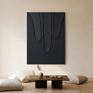 Close-up of a hand-painted 3D textured black abstract oil painting featuring vertical flowing lines in a minimalist Wabi-Sabi style living room.