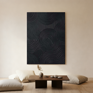 Large hand-painted 3D textured black abstract oil painting with concentric flowing lines, displayed on a white wall in a modern minimalist staircase setting.