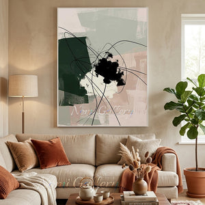 Handmade abstract minimalist oil painting featuring sage green, blush pink, and black textured color blocks with fluid black lines, displayed on a beige wall above a modern living room sofa.