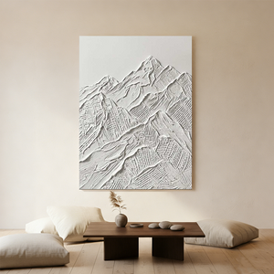 Large hand-painted 3D textured white oil painting depicting abstract snow-capped mountains in a minimalist Boho-style room with a wooden table.