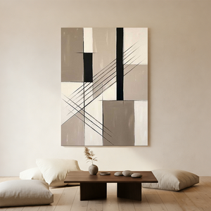Large hand-painted geometric abstract oil painting with beige and black color blocks and diagonal lines, displayed in a warm minimalist living room setting.