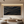 A hand-painted 3D textured oil painting featuring a radiant gold metallic semi-circle arch on a deep black background, styled in a luxury modern living room with warm lighting.