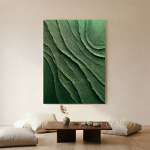 100% hand-painted heavy textured forest green abstract oil painting featuring sculptural impasto waves on canvas, styled as a premium oversized statement piece above a fireplace in a modern luxury living room as visualized in green-painting-for-room-decor.jpg and green-painting-for-modern-room-decor.jpg.