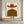 vintage-red-hat-cowboy-art-above-the-wooden-cabinet-04.webp