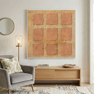 Hand-painted minimalist Wabi-Sabi oil painting featuring a 3 by 3 grid of nine heavily textured terracotta red squares with raw, deckled edges over a mottled warm beige sand-toned background.