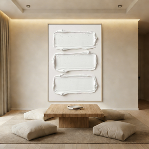 A hand-painted 3D textured oil painting in all-white, featuring a central rectangular relief block with heavy impasto strokes, displayed in a bright modern Wabi-Sabi styled living room.